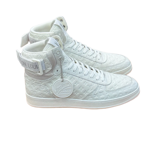 The Louis Vuitton Rivoli White & Black sneakers.