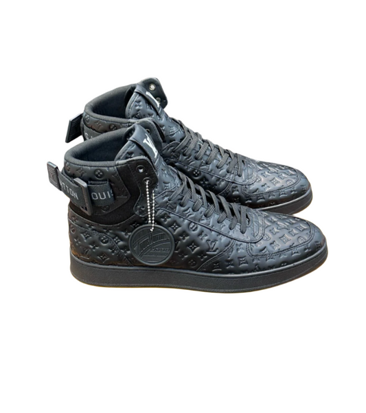 The Louis Vuitton Rivoli White & Black sneakers.